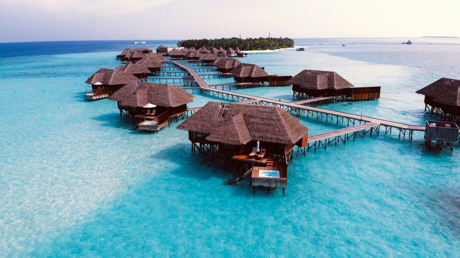 Maldives overwater villas turquoise lagoon